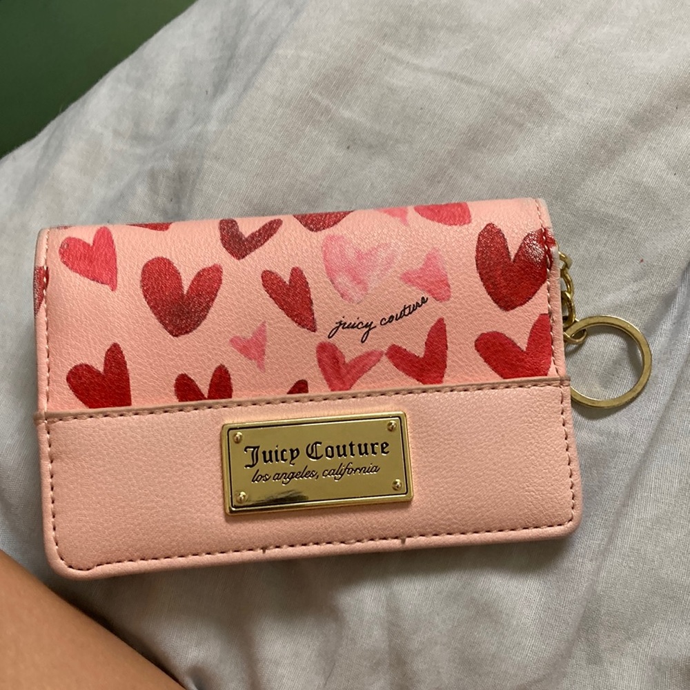 Selling a pink heart juicy couture wallet